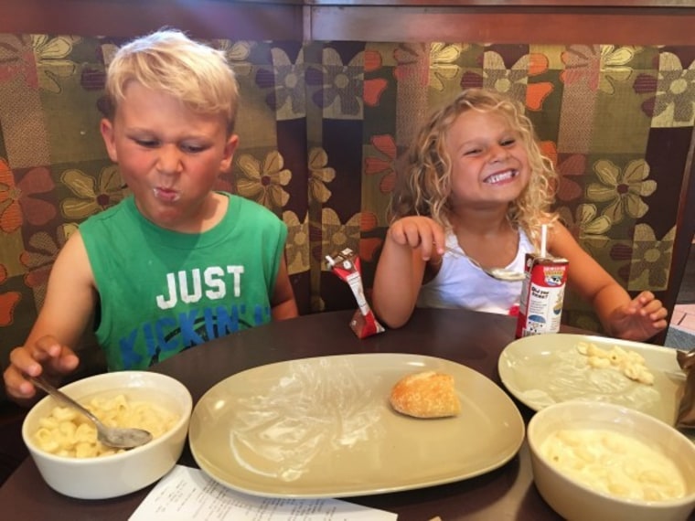 Kids eating in a restaurant