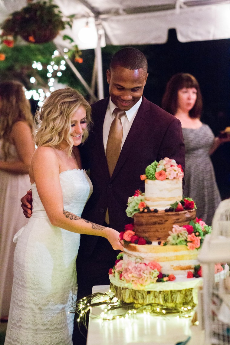 The bride bought a "bare cake" and neighbors decorated it just like pros.