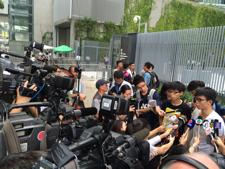 Image: Joshua Wong (second right, wearing black) in Sept. 2014