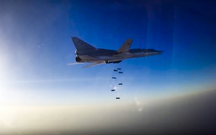 Image: An image provided by Russia's defense ministry shows a Russian Tu-22M3 bomber during an air strike over Aleppo, Syria on Tuesday.