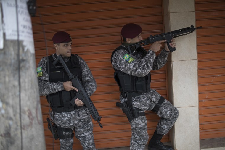 Image: A police operation in Vila do Joao slum of Rio de Janeiro on Aug. 11, 2016