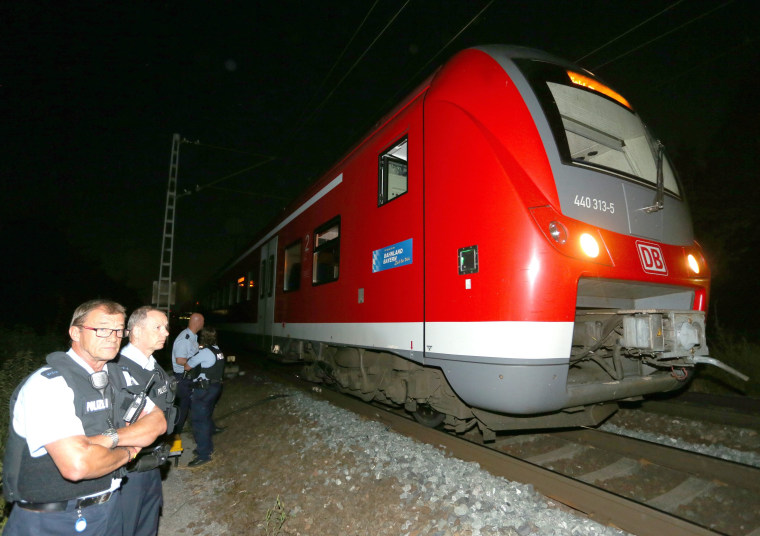 Image: Police guard train after attack on July 18, 2016