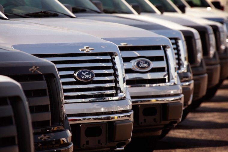 Image: Ford vehicles are offered for sale at a dealership