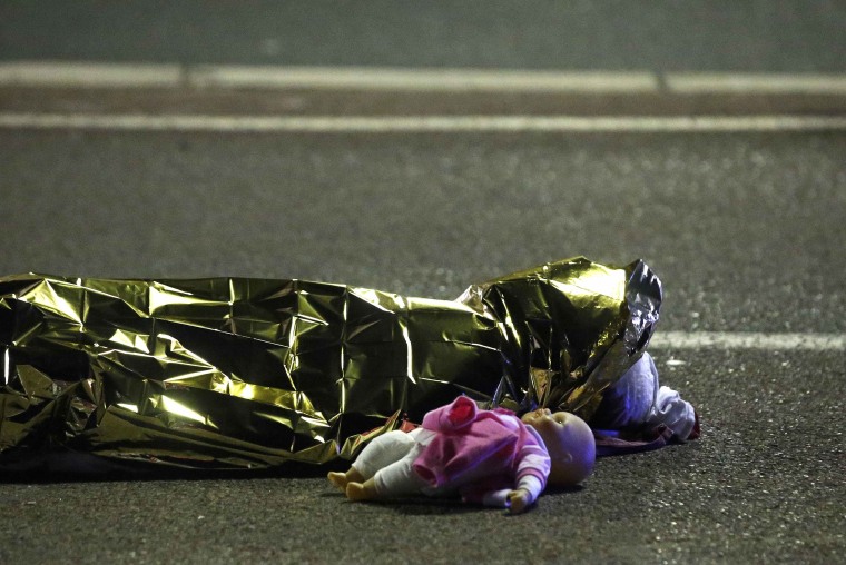 Image: A body and doll on ground after truck attack in Nice