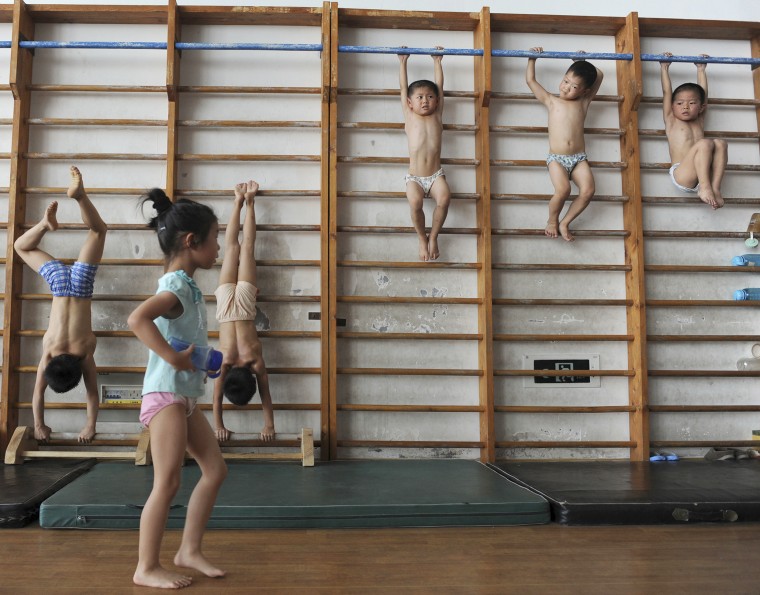 Image: Young gymnasts take part in a training session for four to seven-year-olds in 2010