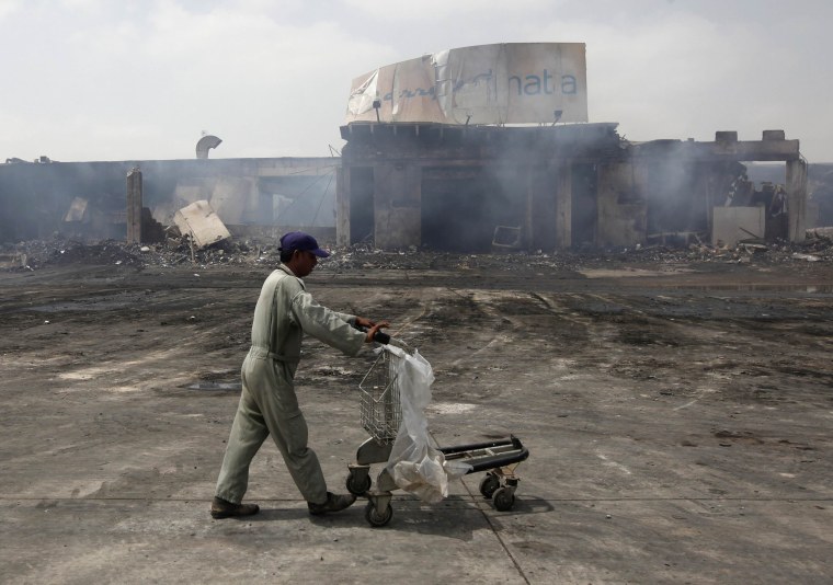 Image: Militant attacks are fairly common in Karachi, such as the 2014 battle that destroyed buildings at the city's international airport