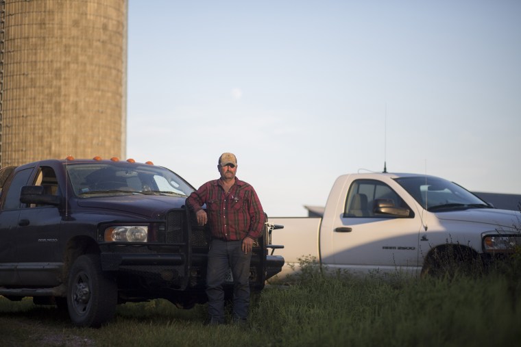 Doug Hall in front of his truck on his farmland in rural Neligh, Neb., on August 15, 2016.