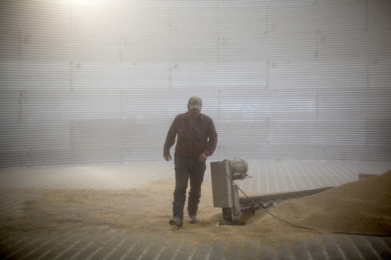 Doug Hall at his grain bin north of Tilden, Neb., where he was loading soy beans into a truck to be shipped off on a train from Brunswick, Neb., on August 15, 2016.