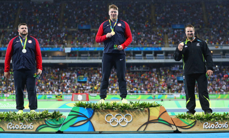 Image: Silver medalist, Joe Kovacs, gold medalist, Ryan Crouserand bronze medalist, Tomas Walsh of New Zealand