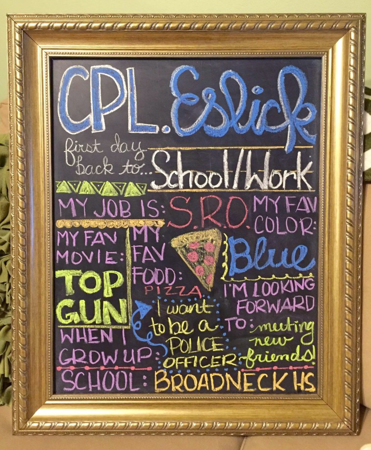 Eslick's chalkboard back-to-school sign was designed by his wife, April.