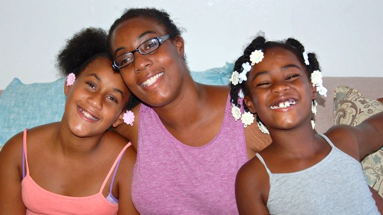 Tiffany Clarke and her two daughters.