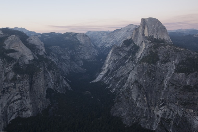 Image: Dusk settles on Half Dome and Yosemite Valley in Yosemite National Park, California