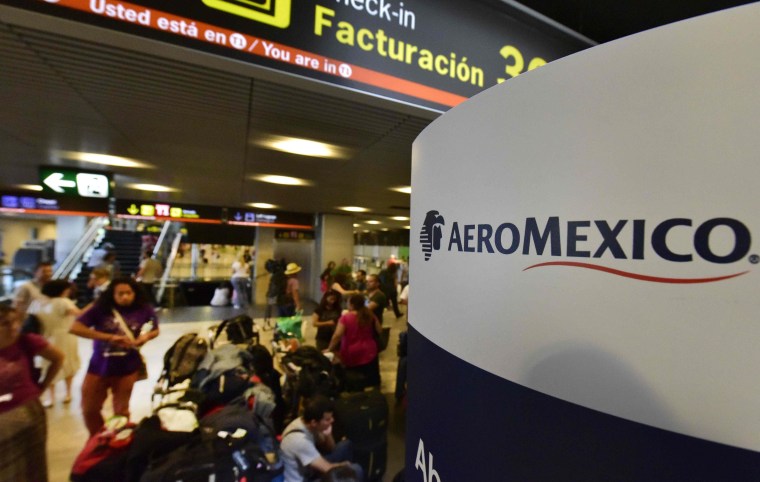 File photo: Passengers wait to get a seat on a Aeromexico airways's flight.