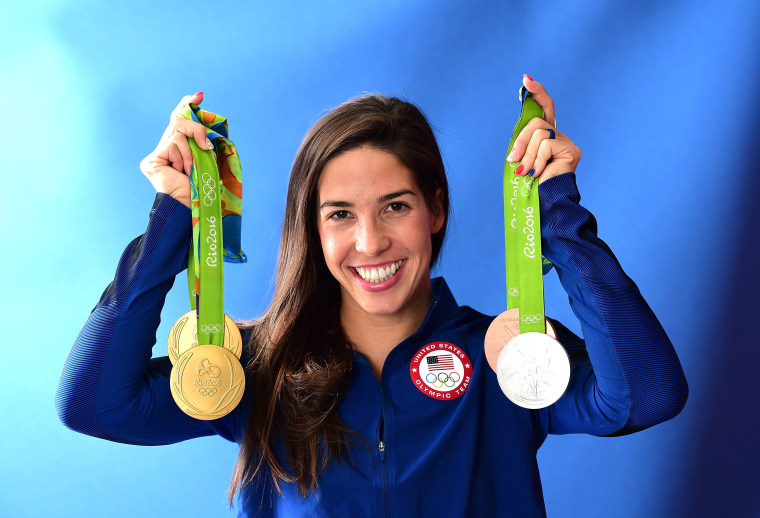 Maya DiRado of the United States poses with her four medals on the Today show