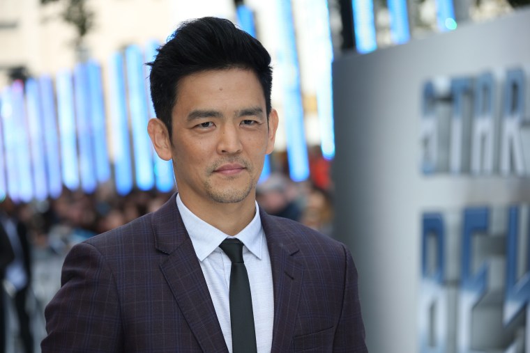 Actor John Cho poses for photographers upon arrival at the premiere of the film 'Star Trek Beyond' in London.