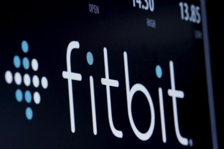 The ticker symbol for Fitbit is displayed at the post where it is traded  on the floor of the NYSE