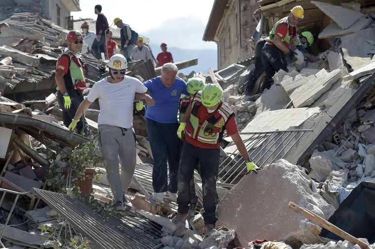 Image: Rescuers work in Amatrice, Italy