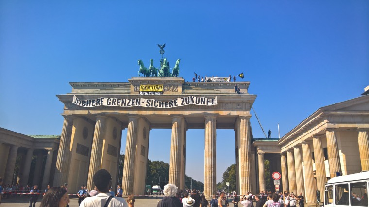 Image: Anti-Islam activists climed on Berlin's Brandenburg Gate for an hour.