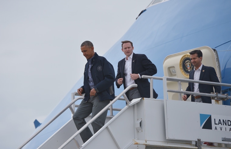 Image: President Barack Obama steps off Air Force One upon arrival at Miami International Airport