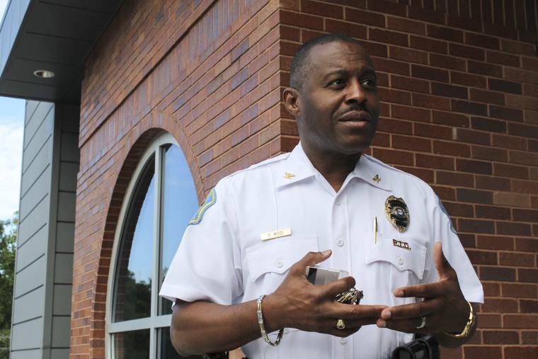 Ferguson Police Chief Delrish Moss speaks outside of the city's downtown police building.