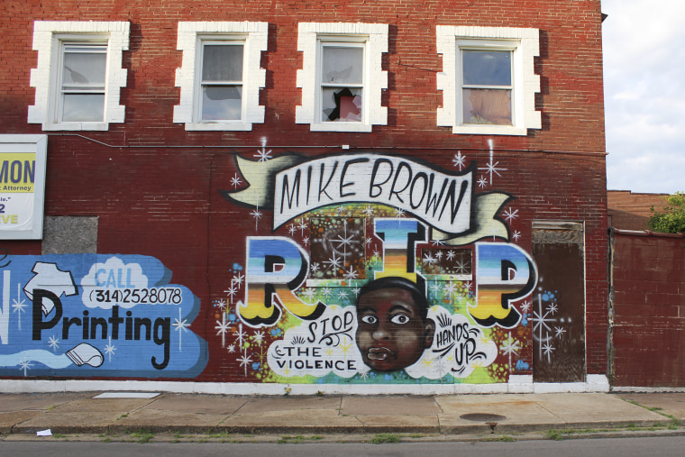 Michael Brown, 18, was gunned down by former Ferguson police officer Darren Wilson on Aug. 9, 2014. He lie in the street dead and bleeding on Canefied Drive for several hours. This mural is located in West St. Louis.