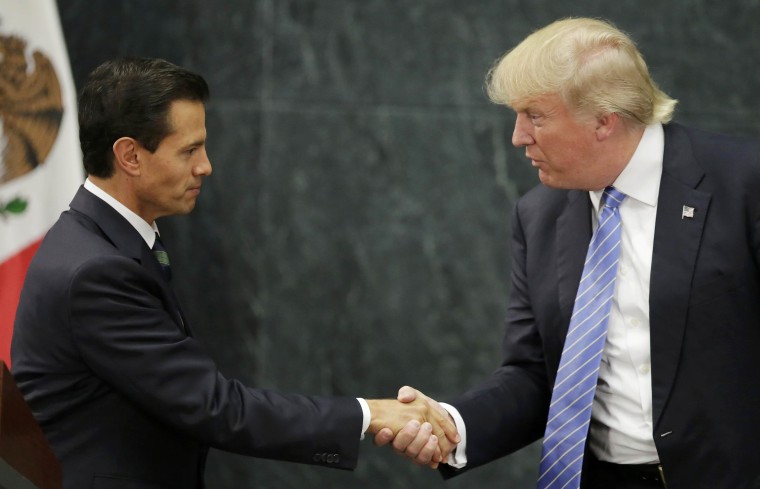 Image: U.S. presidential nominee Trump and Mexico's President Pena Nieto shake hands in Mexico City