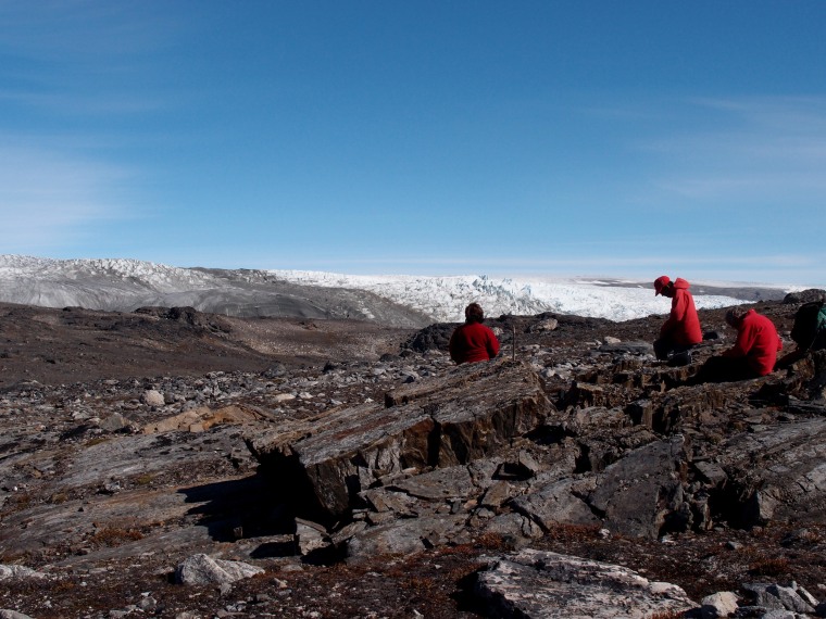 Associate Professor Vickie Bennett, Professor Allen Nutman and Dr Clark Friend, examine the rocks in Greenland.