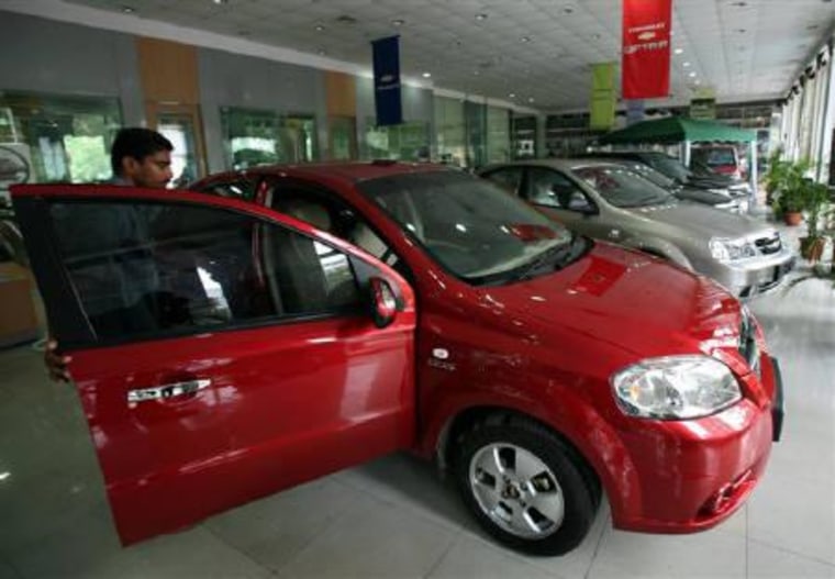 A new car on display at a showroom. REUTERS/Punit Paranjpe/Files