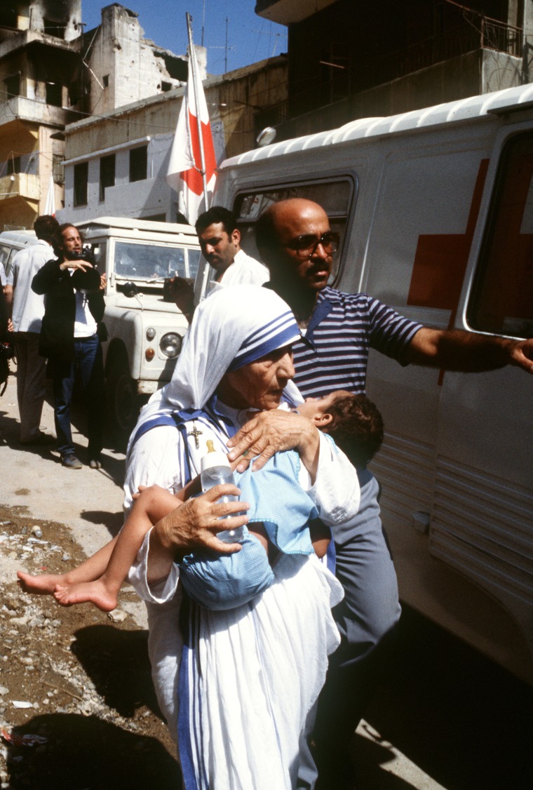 Peace Nobel Prize Mother Teresa hugs a c
