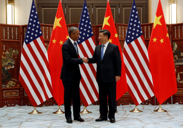 Image: China's President Xi Jinping and U.S. President Barack Obama shake hands before a bilateral meeting ahead of the G20 Summit, in Ming Yuan Hall at Westlake Statehouse in Hangzhou