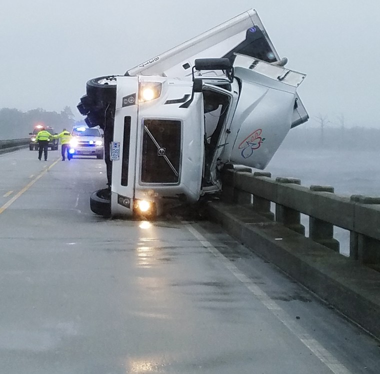 A tractor-trailer overturned on on the Alligator River Bridge in North Carolina.