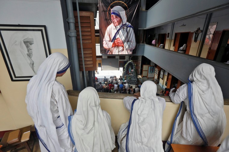 Image: Nuns from the Missionaries of Charity in Kolkata, India, watch a live broadcast of the canonisation of Mother Teresa
