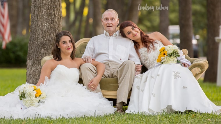 IMAGE: Duncan twins with dad