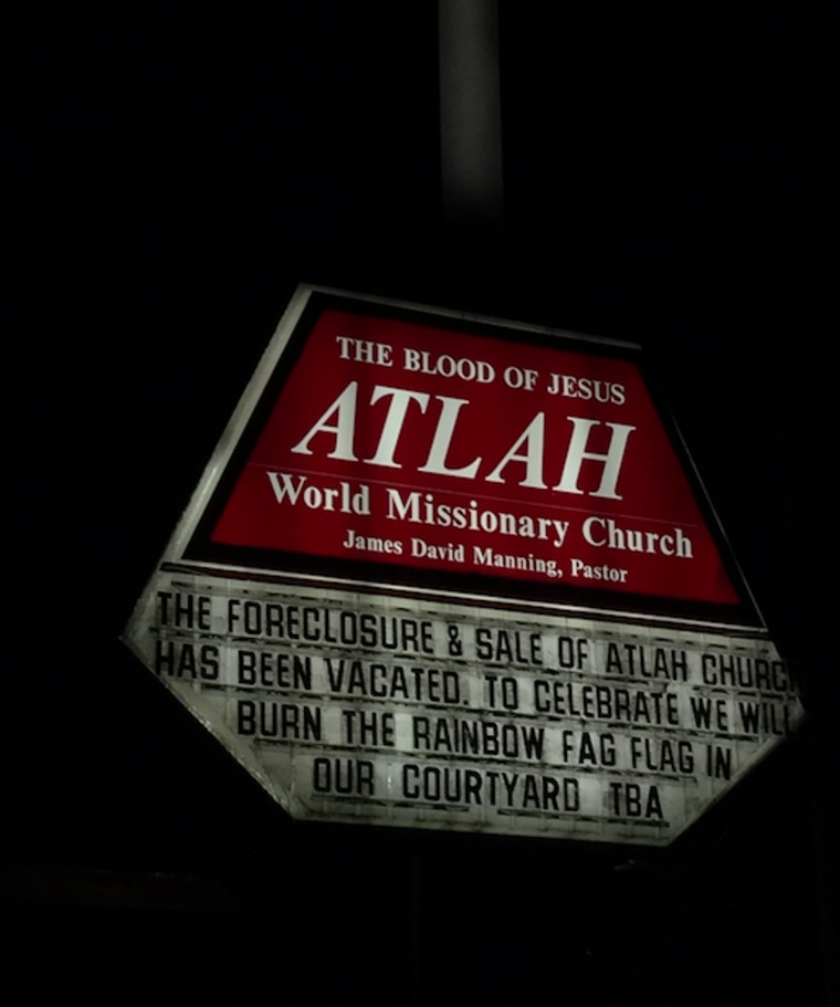 A sign posted outside the Atlah Worldwide Missionary Church in Harlem, New York.