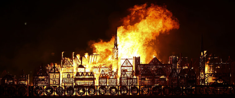Image: TOPSHOT-BRITAIN-LIFESTYLE-HISTORY-FIRE-ART