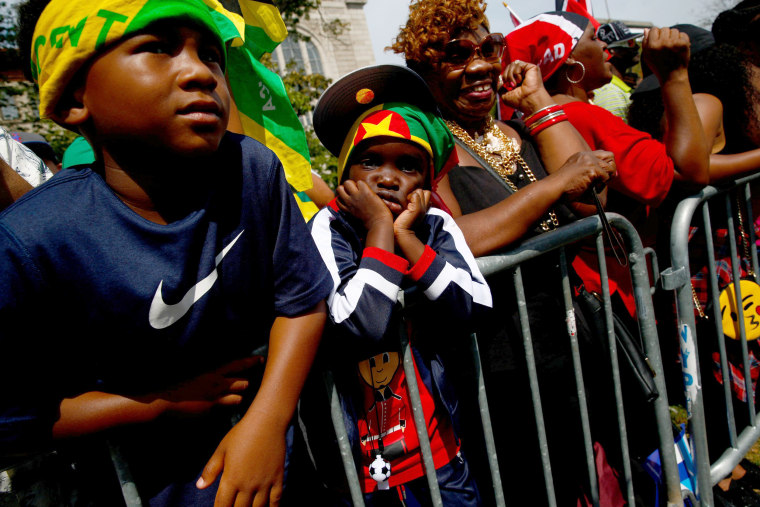 Image: Spectators are seen during the West Indian Day Parade in the Brooklyn borough of New York