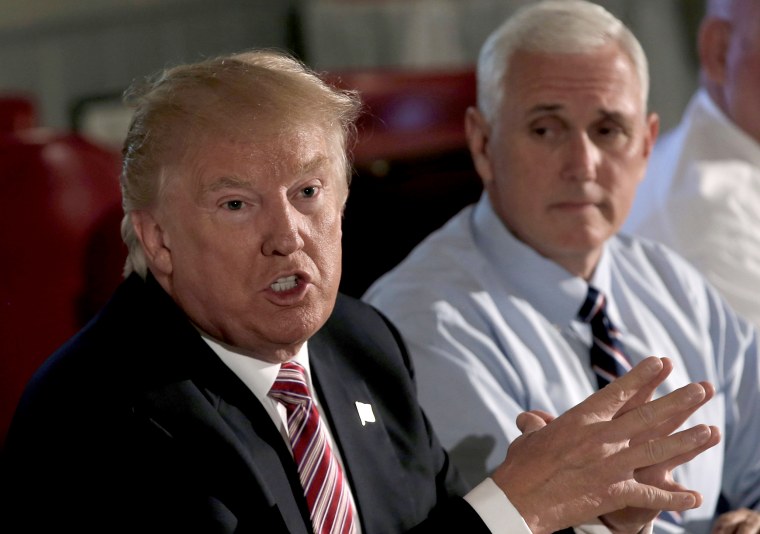 Image: Republican presidential nominee Donald Trump and his running mate Indiana Governor Mike Pence meet with labor leaders during a campaign stop in Brook Park