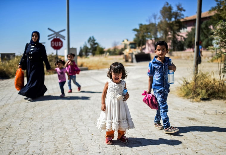 Image: TOPSHOT-TURKEY-SYRIA-ARMY-REFUGEES