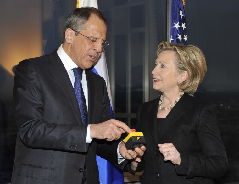 Then Secretary of State Hillary Clinton presents Russian Foreign Minister Sergey Lavrov with a device with a red button symbolizing the intention to "reset" U.S.-Russian relations during their meeting in Geneva, Switzerland, in 2009.