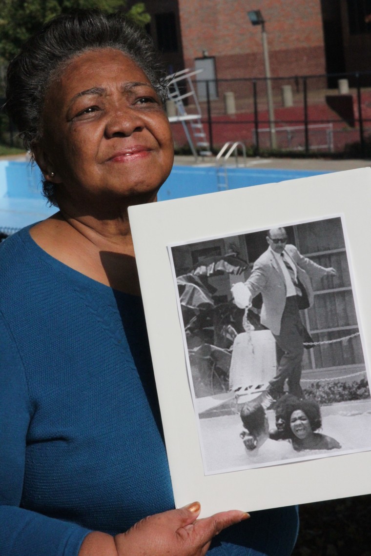 Mimi Jones of Boston holds a historic photo of her at age 17 that circled the globe during the height of the Civil Rights Movement.