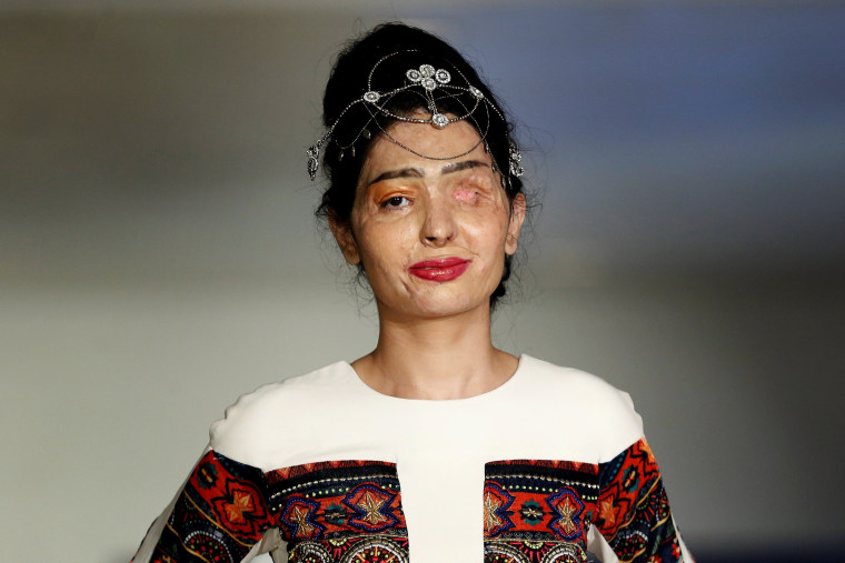 Image: Indian model and acid attack survivor Reshma Quereshi presents a creation from Indian designer Archana Kochhar's Spring/Summer 2017 collection during New York Fashion Week in the Manhattan borough of New York