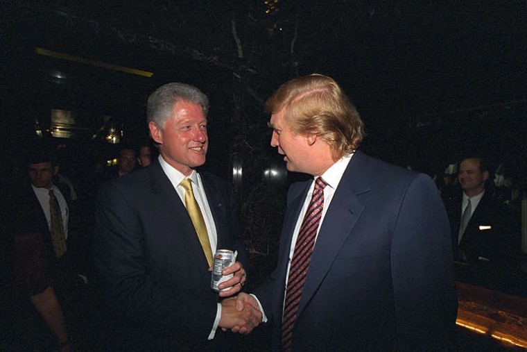 President Clinton shakes hands with Trump outside Trump Tower in New York on June 16, 2000.