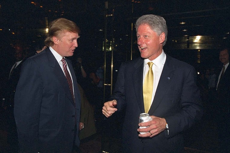 President Clinton talks with Trump outside Trump Tower.