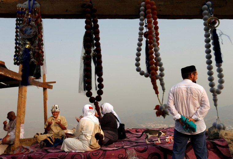 Image: Pilgrims pray at Mount Al-Noor ahead of the annual haj pilgrimage in the holy city of Mecca