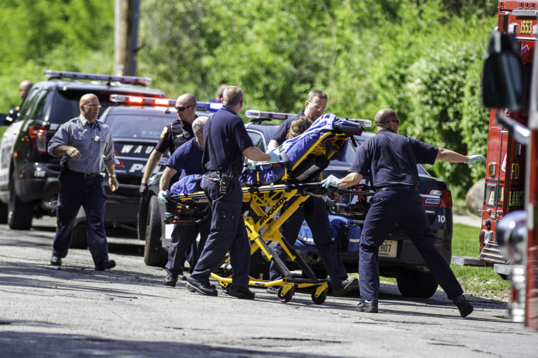 In this May 31, 2014 file photo rescue workers take 12-year-old stabbing victim Payton Leutner to an ambulance in Waukesha, Wis.
