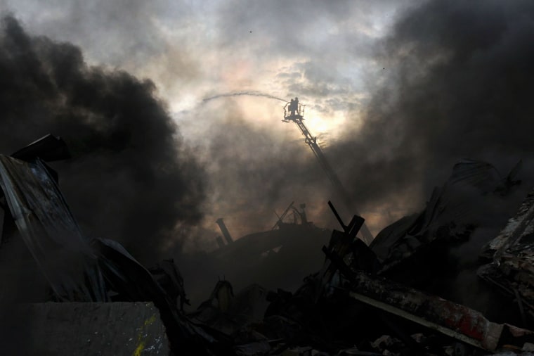 Image: TOPSHOT-BANGLADESH-FIRE-LABOUR