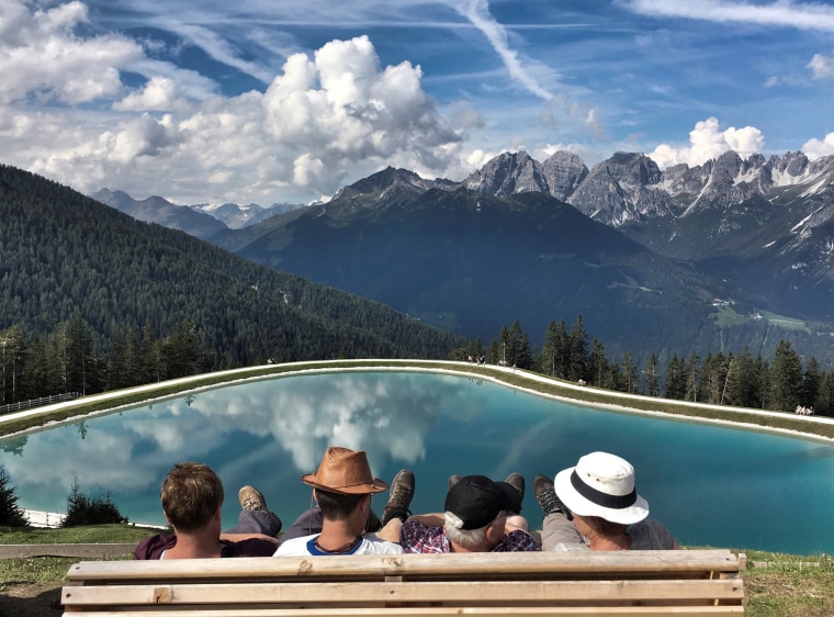 Image: People enjoy the view from Serles mountain on a sunny autumn day in the western Austrian village of Mieders