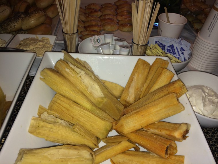 Tamales are served - and called a secret weapon - at a brunch for Latinas who support Hillary Clinton. The event was held Sept. 10, 2016.