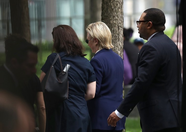 Image: Clinton leaves Sept. 11 ceremony