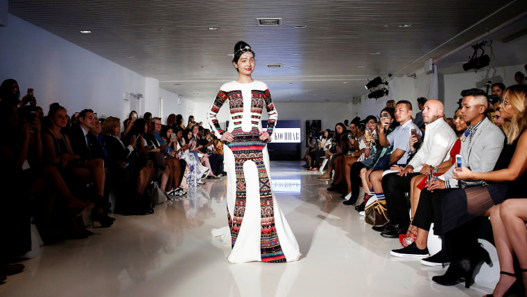 Image: Indian model and acid attack survivor Reshma Quereshi presents a creation from Indian designer Archana Kochhar's Spring/Summer 2017 collection during New York Fashion Week in the Manhattan borough of New York